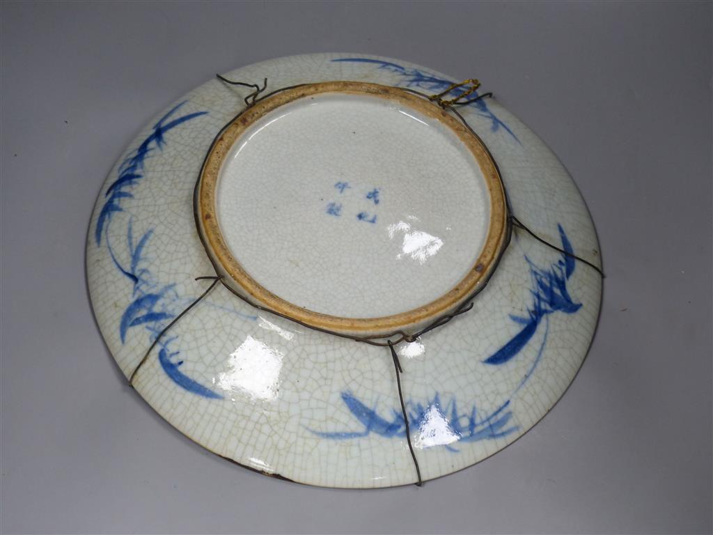 A pair of Chinese crackleglaze dishes and a pair of polychrome jars, late 19th/early 20th century